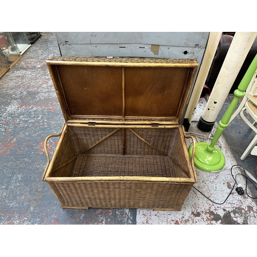 200 - A mid 20th century wicker and cane twin handled blanket box - approx. 51cm high x 90cm wide x 48cm d... 