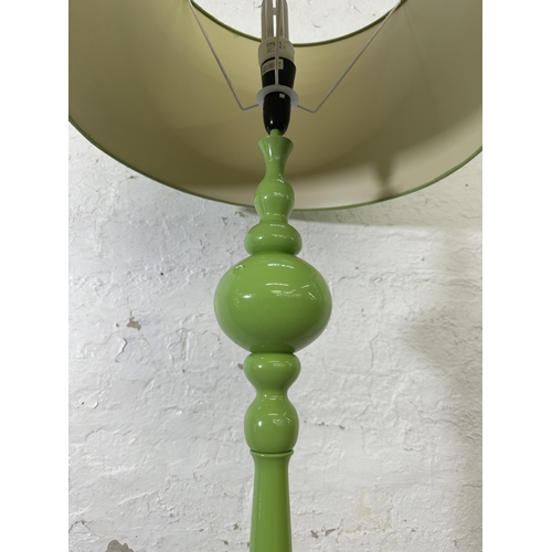 200A - A modern green metal standard lamp with shade - approx. 163cm high