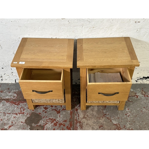 206 - A pair of modern oak bedside cabinets - approx. 58cm high x 44cm wide x 35cm deep