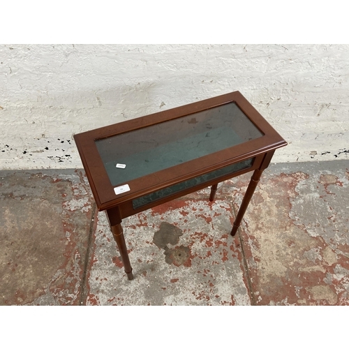 21 - A mahogany bijouterie table - approx. 69cm high x 60cm wide x 29cm deep