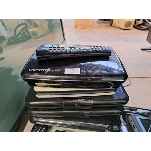 709 - A collection of AV items to include Sony DVP-NS36 DVD player, remote controls, portable DVD players ... 