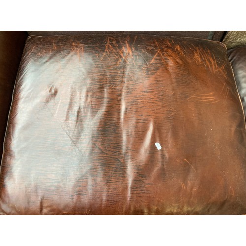 87 - A brown leather and fabric upholstered four seater sofa - approx. 79cm high x 252cm long x 106cm dee... 