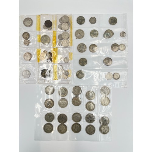 2245C - A collection of coins and medals to include twenty four .500 silver half crowns etc.