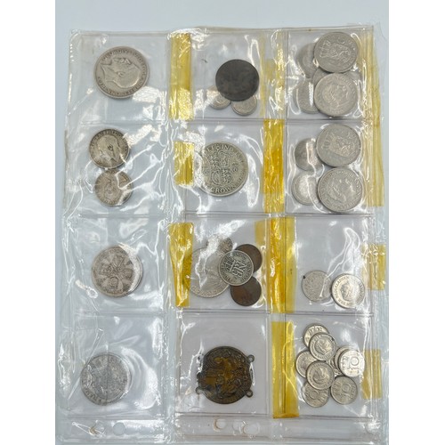 2245C - A collection of coins and medals to include twenty four .500 silver half crowns etc.