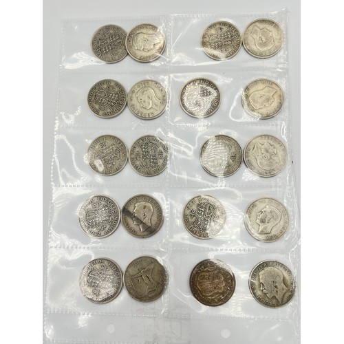 2245C - A collection of coins and medals to include twenty four .500 silver half crowns etc.