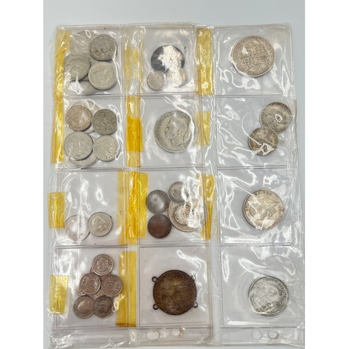 2245C - A collection of coins and medals to include twenty four .500 silver half crowns etc.