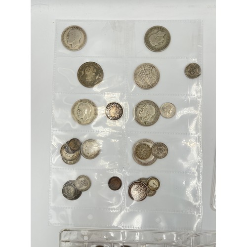 2245D - A collection of coins to include ten .925 silver threepences, seven .500 silver half crowns, 1873 .9... 