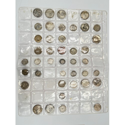 2245D - A collection of coins to include ten .925 silver threepences, seven .500 silver half crowns, 1873 .9... 