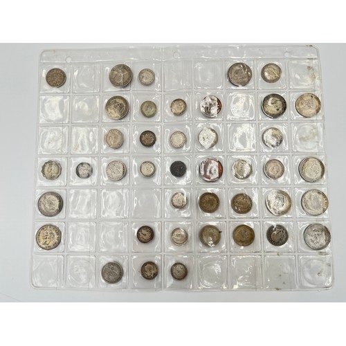 2245D - A collection of coins to include ten .925 silver threepences, seven .500 silver half crowns, 1873 .9... 