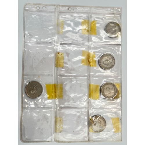 2245D - A collection of coins to include ten .925 silver threepences, seven .500 silver half crowns, 1873 .9... 