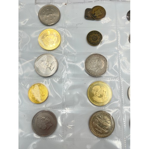 2245E - A collection of coins to include Chinese silver 1 yuan, Japanese silver 50 sen, two .925 silver thre... 