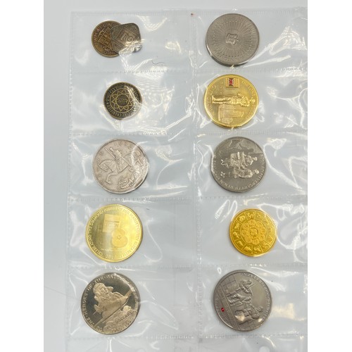 2245E - A collection of coins to include Chinese silver 1 yuan, Japanese silver 50 sen, two .925 silver thre... 