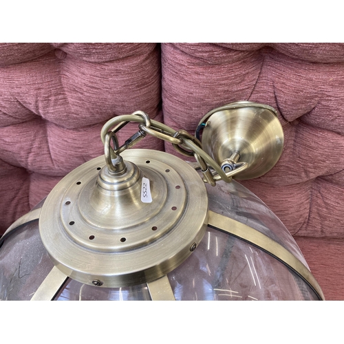 202 - A pair of Laura Ashley Odiham 3691112 brass and glass three branch sphere pendant lights