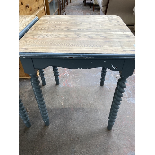 209 - A pair of oak and grey painted barley twist dining tables - approx. 77cm high x 68cm square