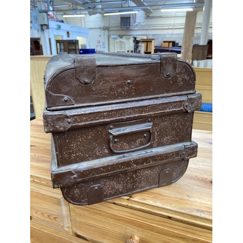 210 - An early 20th century brown metal travel trunk - approx. 30cm high x 55cm wide x 30cm deep