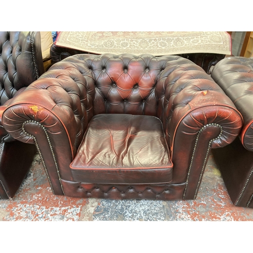 222 - A pair of oxblood leather Chesterfield club chairs