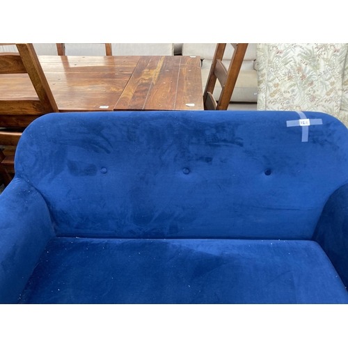 228 - A Victorian style blue fabric upholstered two seater sofa