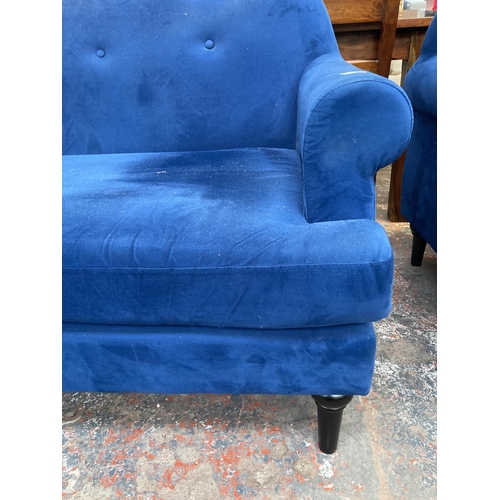 229 - A Victorian style blue fabric upholstered two seater sofa