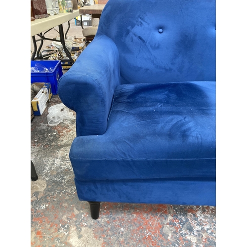 229 - A Victorian style blue fabric upholstered two seater sofa