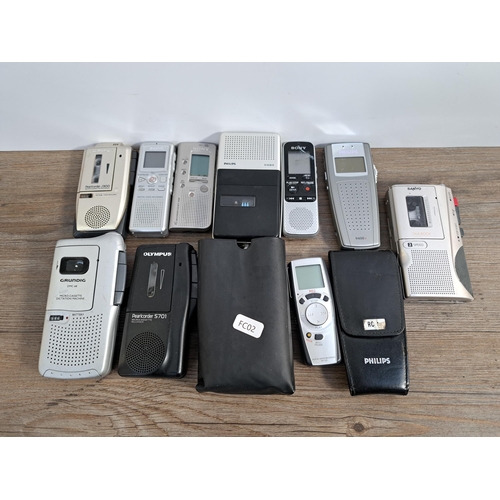 656 - A collection of voice recorders to include Olympus Pearlcorder S701 microcassette, Grundig DMC-68 mi... 