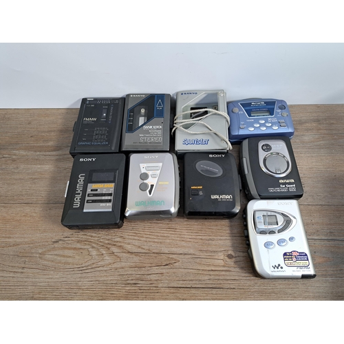 657 - A collection of personal cassette players to include Sony Walkman WM-EX382, WM-EX102, WM-FX290 etc.