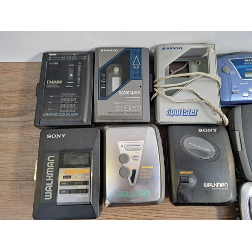 657 - A collection of personal cassette players to include Sony Walkman WM-EX382, WM-EX102, WM-FX290 etc.