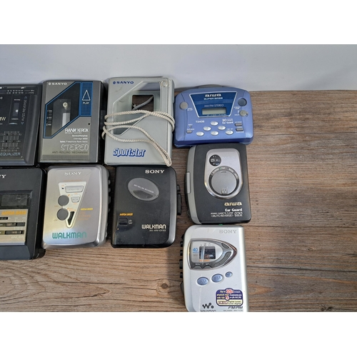 657 - A collection of personal cassette players to include Sony Walkman WM-EX382, WM-EX102, WM-FX290 etc.