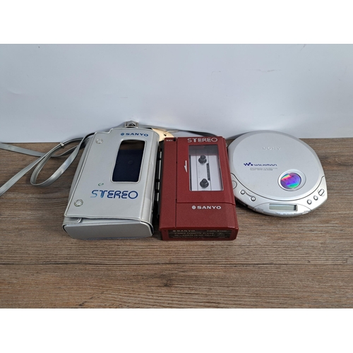 658 - Two items, one cased Sanyo M4440 personal cassette player and one Sony Walkman D-E351 personal CD pl... 