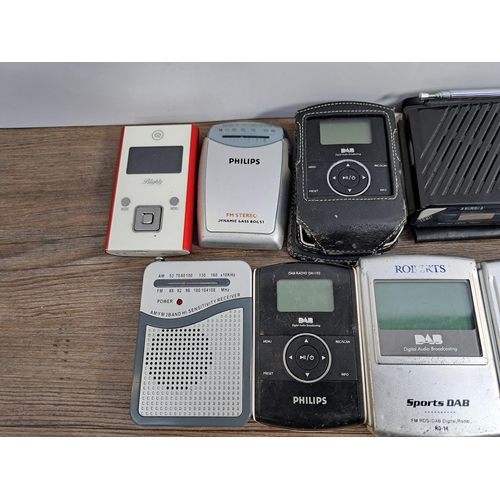 659 - A collection of pocket radios to include Philips DA1102 DAB, cased Texet HH-990A two-band, two Rober... 