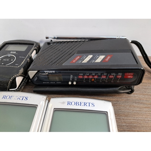 659 - A collection of pocket radios to include Philips DA1102 DAB, cased Texet HH-990A two-band, two Rober... 