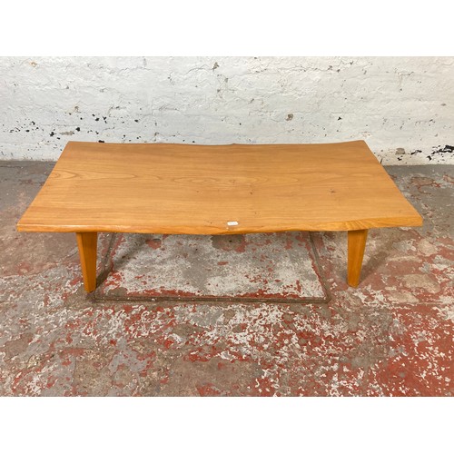 165 - An elm and beech rectangular coffee table
