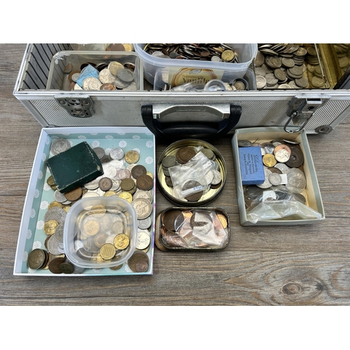 486 - An aluminium flight case containing a very large collection of world coins