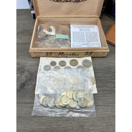 489 - A large collection of coins and collectables to include packaged pre-decimal sets, commemorative coi... 