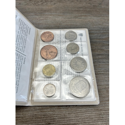 489 - A large collection of coins and collectables to include packaged pre-decimal sets, commemorative coi... 