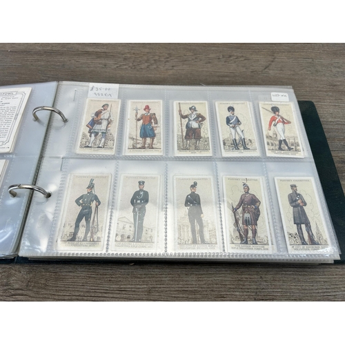 491 - A The Nostalgia Album containing a large collection of various cigarette cards