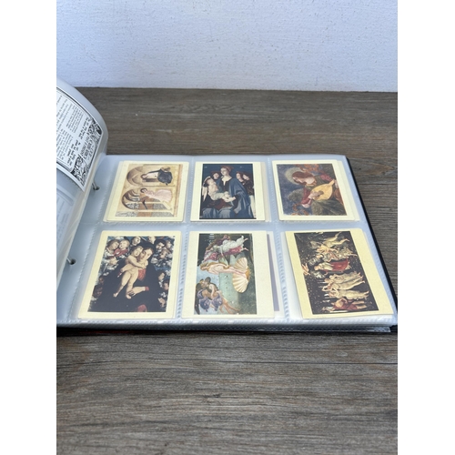 496 - A cigarette card album containing a large collection of various cigarette cards