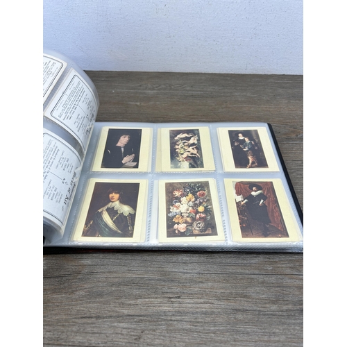 496 - A cigarette card album containing a large collection of various cigarette cards