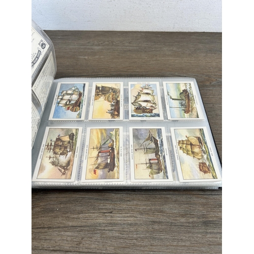 497 - A cigarette card album containing a large collection of various cigarette cards