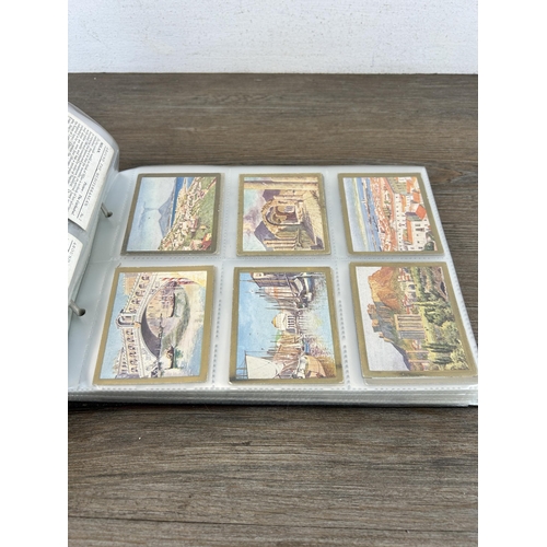 497 - A cigarette card album containing a large collection of various cigarette cards