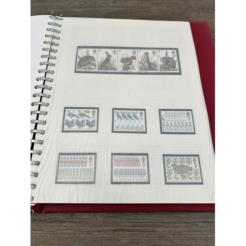 498 - An album containing a large collection of various stamps