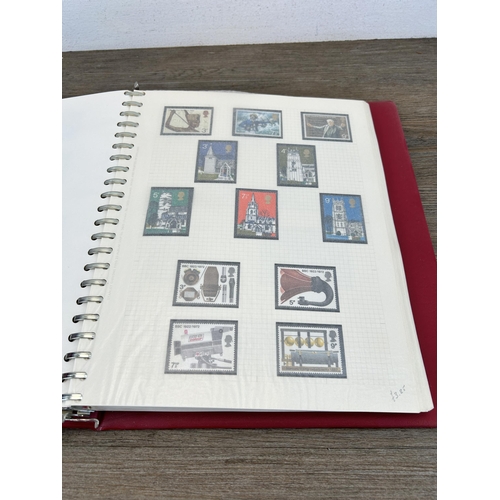 498 - An album containing a large collection of various stamps