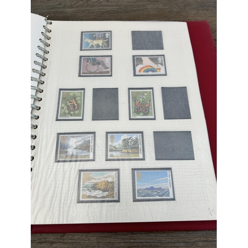 498 - An album containing a large collection of various stamps