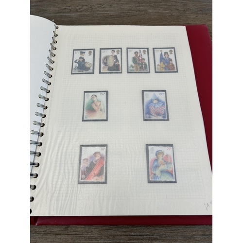 498 - An album containing a large collection of various stamps