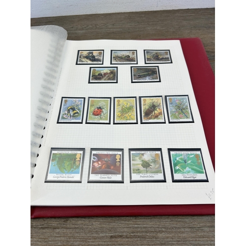 498 - An album containing a large collection of various stamps