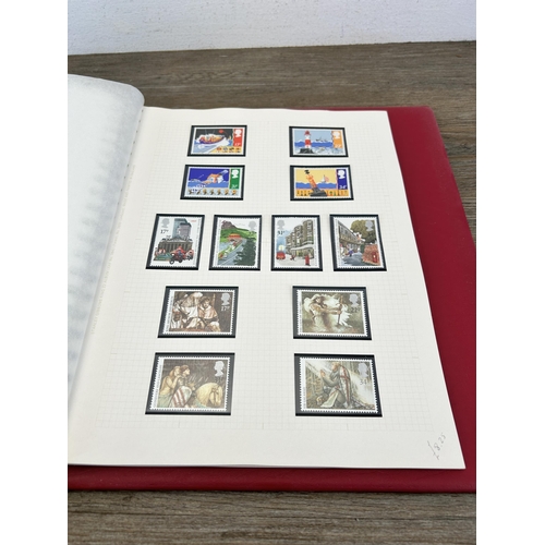 498 - An album containing a large collection of various stamps