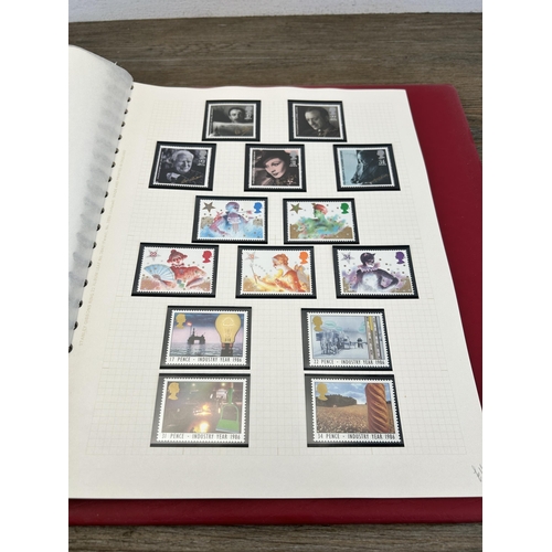 498 - An album containing a large collection of various stamps