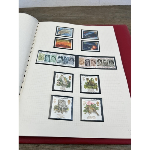 498 - An album containing a large collection of various stamps