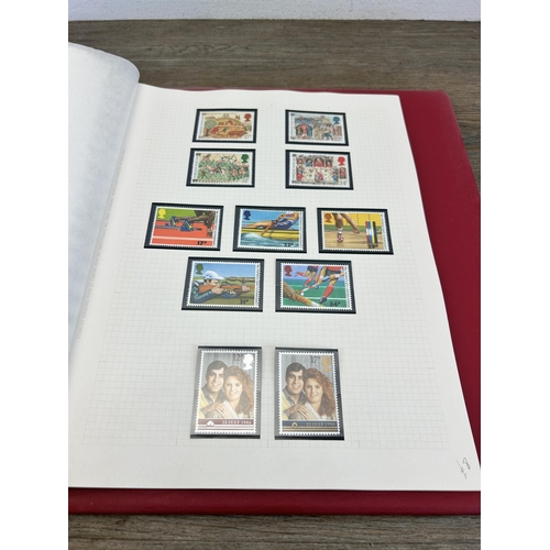 498 - An album containing a large collection of various stamps