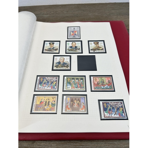 498 - An album containing a large collection of various stamps