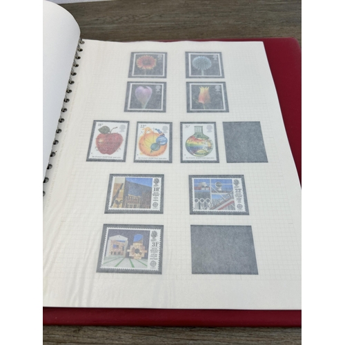 498 - An album containing a large collection of various stamps